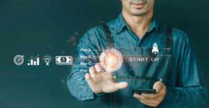 A stock photo of a businessman pressing a button on virtual screens. It includes Start-up Funding Crowdfunding Investment Venture Capital Entrepreneurship business, technology, internet, and networking concept.
